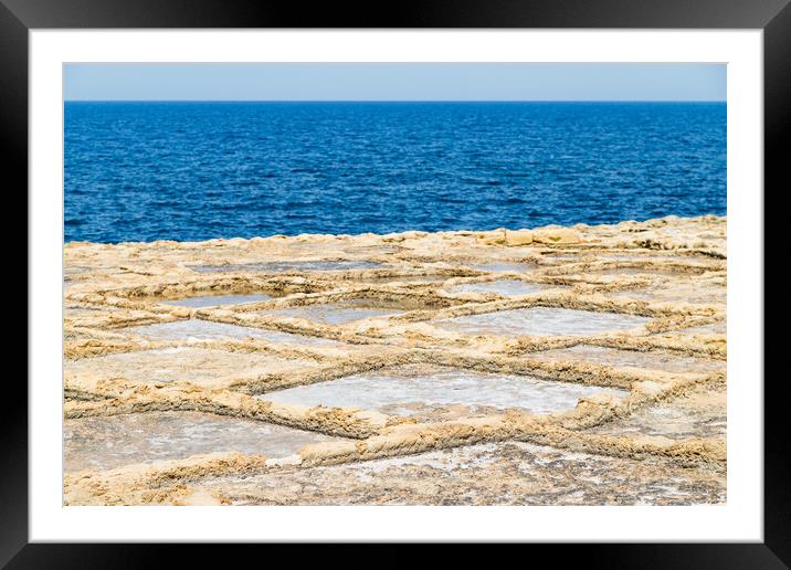 Xwejni salt pans next to the sea Framed Mounted Print by Jason Wells