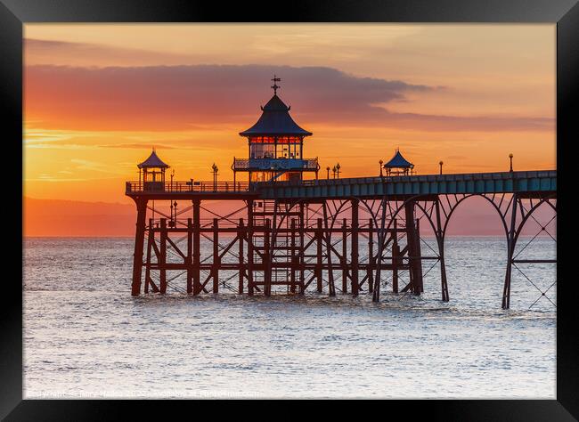 Clevedon Pier head at sunset Framed Print by Rory Hailes
