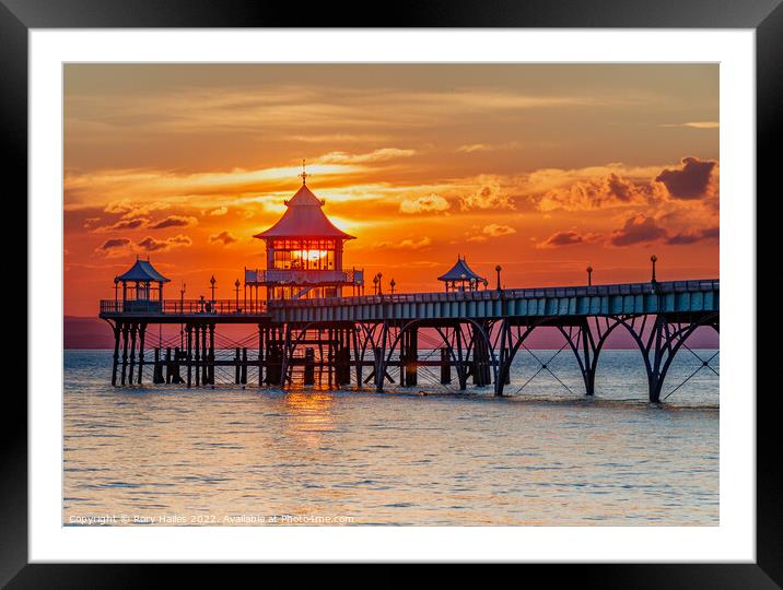 Clevedon Pier at sunset with a colourful horizon Framed Mounted Print by Rory Hailes