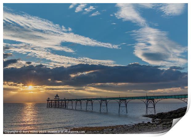 Clevedon Pier with a streak of sunlight going across the channel Print by Rory Hailes