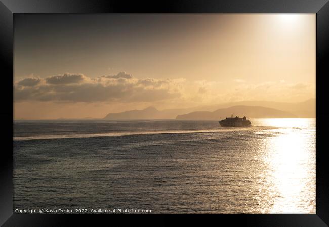 Santorini Bound on a Sunrise Voyage Framed Print by Kasia Design
