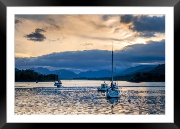 Sailing boats at sunset at Loch Leven near Glencoe Framed Mounted Print by Delphimages Art