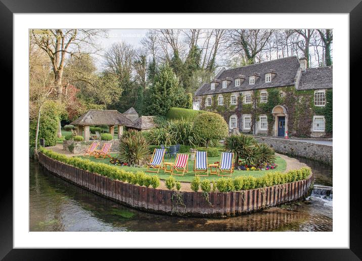 Cotswolds hotel and deck chairs in Bibury Framed Mounted Print by Christopher Keeley
