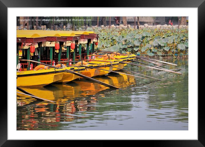 Yellow boats on the river Framed Mounted Print by Stan Lihai