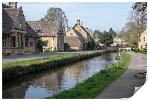 Sunny day at Lower Slaughter in the Cotswolds Print by Christopher Keeley