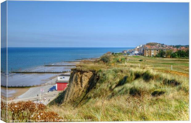 Sheringham Beach, town and Golf Course Canvas Print by Diana Mower