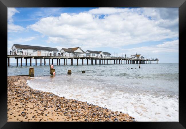 Southwold Pier juts out into the sea Framed Print by Jason Wells