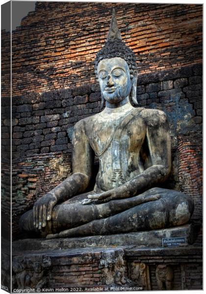 Buddha image,  Sukhothai Historical Park, Thailand Canvas Print by Kevin Hellon