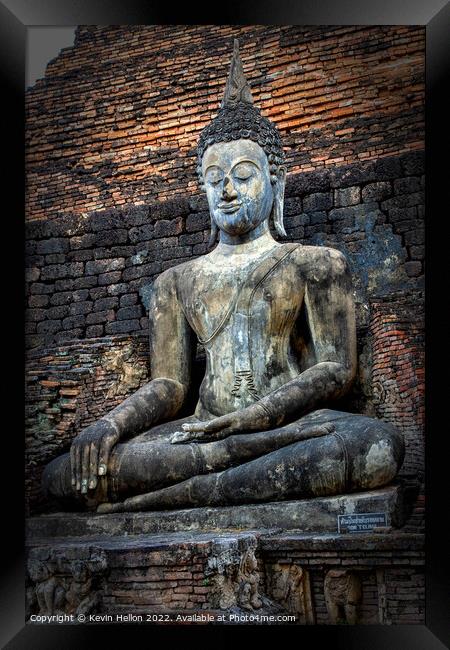 Buddha image,  Sukhothai Historical Park, Thailand Framed Print by Kevin Hellon