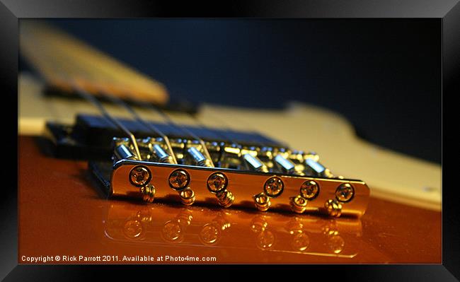Guitar Bridge Close Up Framed Print by Rick Parrott