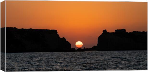 Sunset over Greece Canvas Print by Richie Miles
