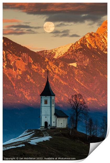 Full moon rising over Jamnik church and Storzic at sunset Print by Ian Middleton