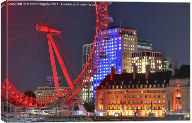 River Thamse with light reflections and the London Eye ferris wheel at night Canvas Print by Michael Piepgras