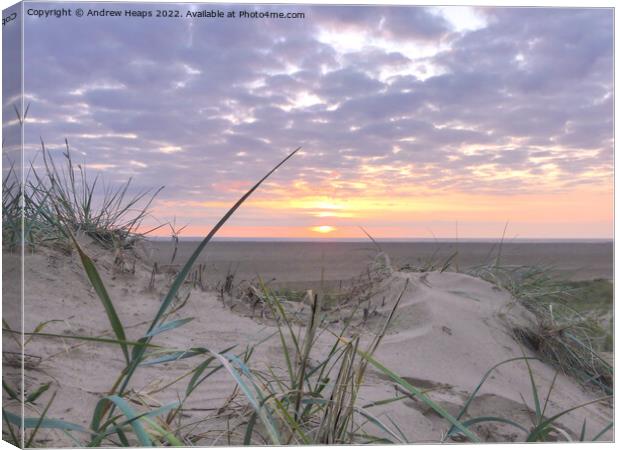 Sunset over sand dunes at Lytham St Annes Canvas Print by Andrew Heaps