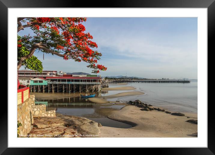 Pier, beach and flame tree, Hua Hin, Thailand Framed Mounted Print by Kevin Hellon