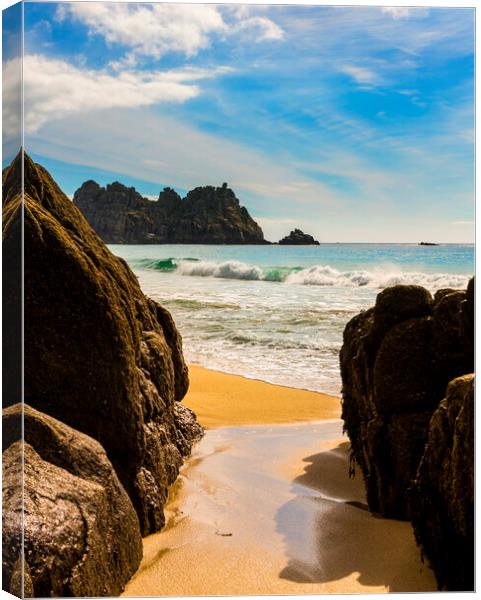 Logan Rock  and Porthcurno beach Canvas Print by Maggie McCall