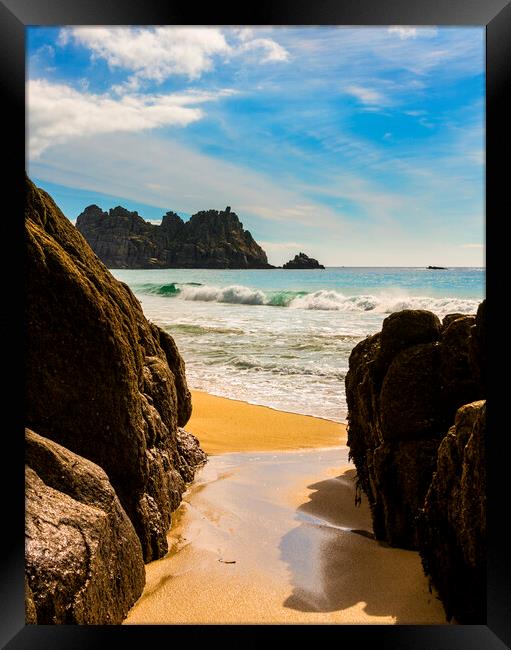 Logan Rock  and Porthcurno beach Framed Print by Maggie McCall