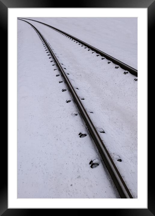 Railway Tracks In Snow Framed Mounted Print by Artur Bogacki