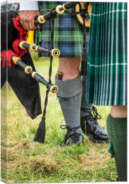 Scottish bagpipers during Highland Games Canvas Print by Delphimages Art