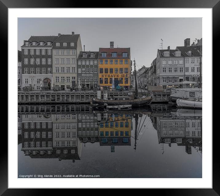 Nyhavn 17 is a famous yellow house at the Nyhavn canal in Copenh Framed Mounted Print by Stig Alenäs