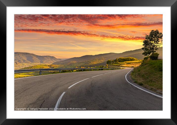 Sunset over vineyards and road. Wachau valley. Austria Framed Mounted Print by Sergey Fedoskin