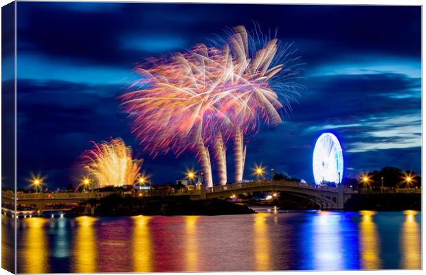 Firework Display Canvas Print by Roger Green