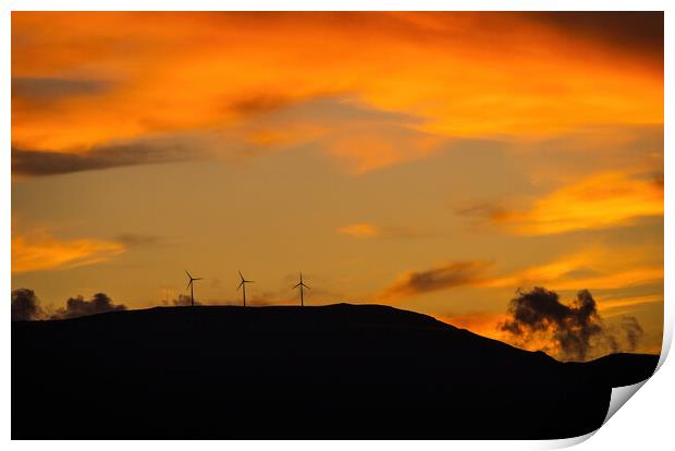 Clean energy power concept with wind turbine on top of a mountain during dramatic sunset Print by Arpan Bhatia