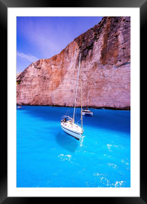 Couple of motor boats anchored on Navagio beach also known as shipwreck beach, Zakynthos island, Greece Framed Mounted Print by Arpan Bhatia