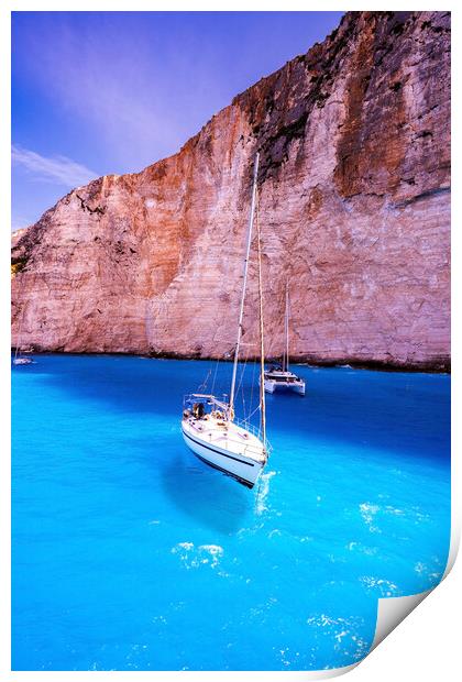Couple of motor boats anchored on Navagio beach also known as shipwreck beach, Zakynthos island, Greece Print by Arpan Bhatia