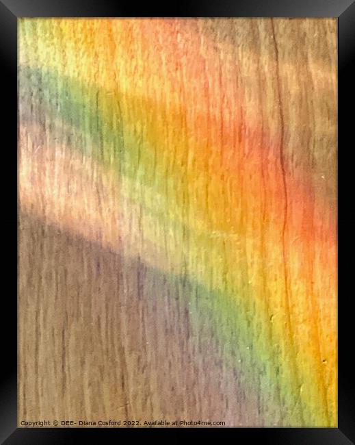 Muted rainbow colours on wood Framed Print by DEE- Diana Cosford