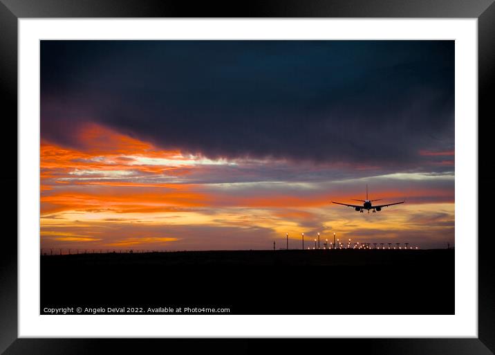Airplane Landing at Dusk Framed Mounted Print by Angelo DeVal