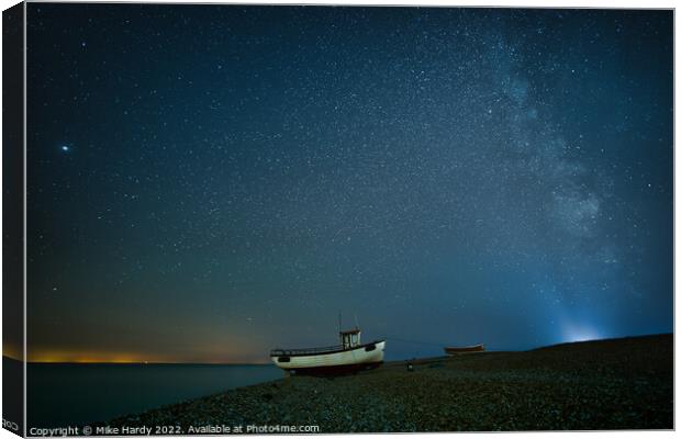 Lighthouse beams the Milky Way at Dungeness Canvas Print by Mike Hardy