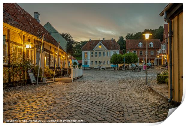 old cobblestone square with a half-timbered hotel in the evening Print by Stig Alenäs