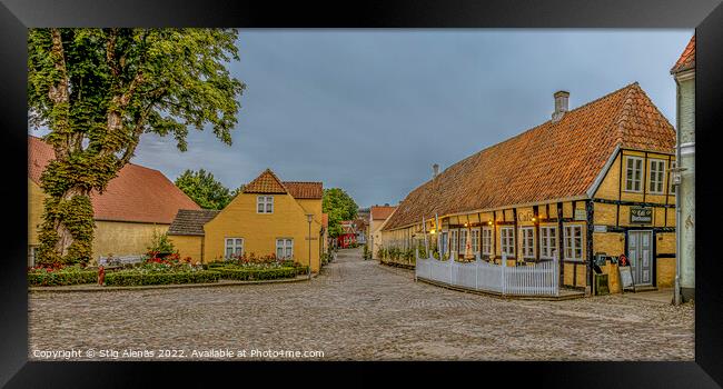 Panoramic wiev of a cobbelstone square and the old timber framed Framed Print by Stig Alenäs