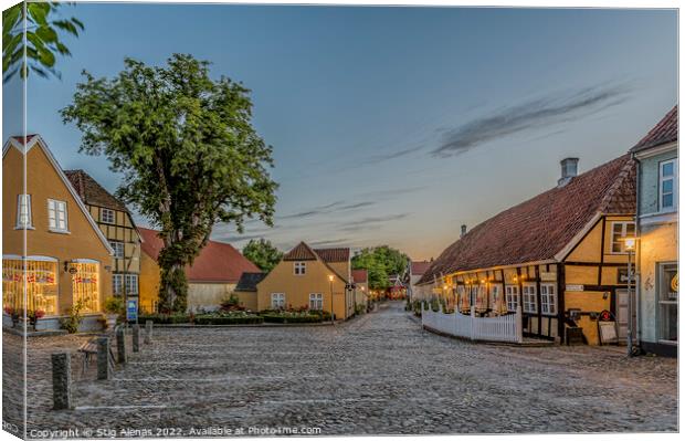 The square in the idyllic town Mariager in the dusk twilight hou Canvas Print by Stig Alenäs