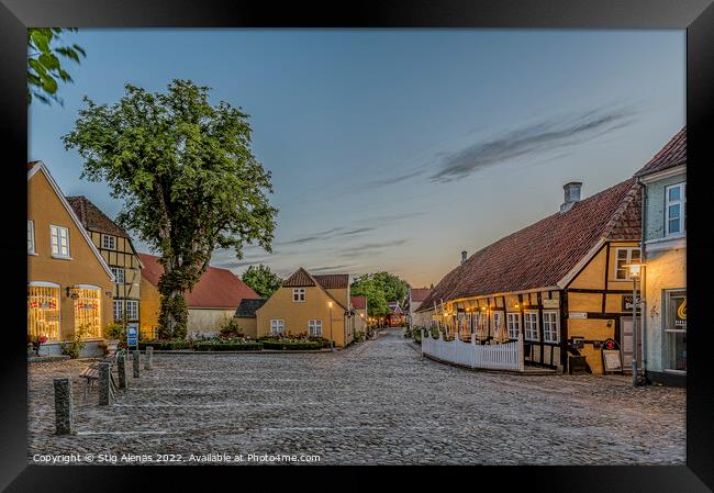 The square in the idyllic town Mariager in the dusk twilight hou Framed Print by Stig Alenäs