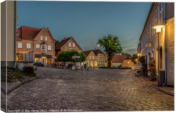 the illuminated square in the small Danish town of Mariager duri Canvas Print by Stig Alenäs