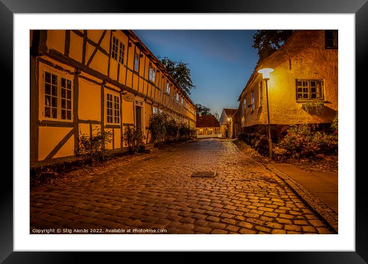 streetlamp at twilight hour in the old cobbled street Framed Mounted Print by Stig Alenäs