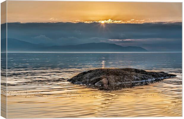 Sunset behind Arran Canvas Print by Valerie Paterson