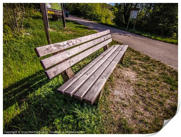 High angle shot of a bench near a street Print by Ingo Menhard