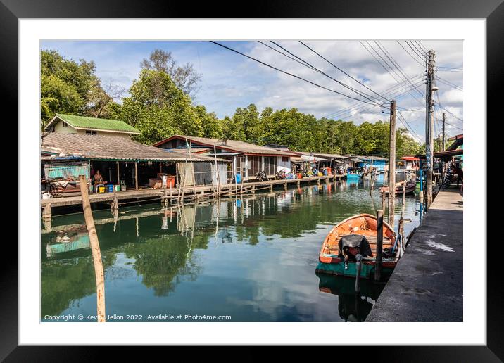 Typical Thai fishing village Framed Mounted Print by Kevin Hellon