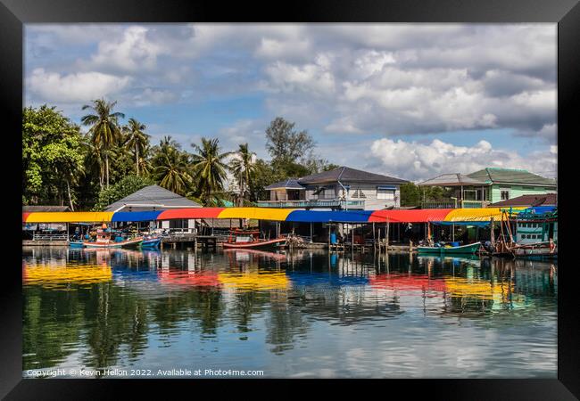 Typical Thai fishing village Framed Print by Kevin Hellon