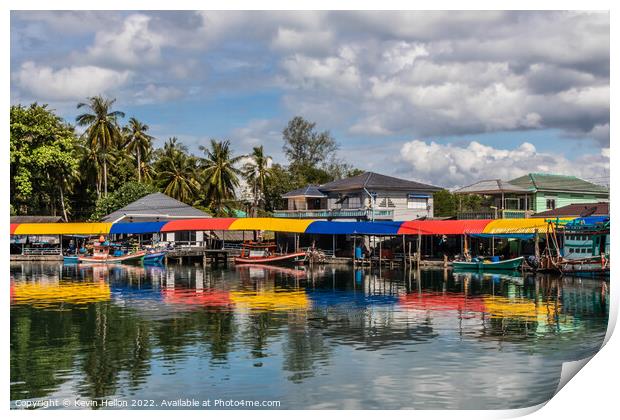 Typical Thai fishing village Print by Kevin Hellon