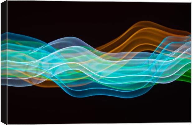 Abstract light trails Canvas Print by Bryn Morgan