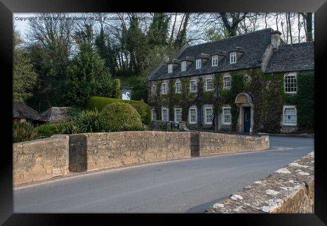 Bibury Bridge in the Cotswolds Framed Print by Christopher Keeley