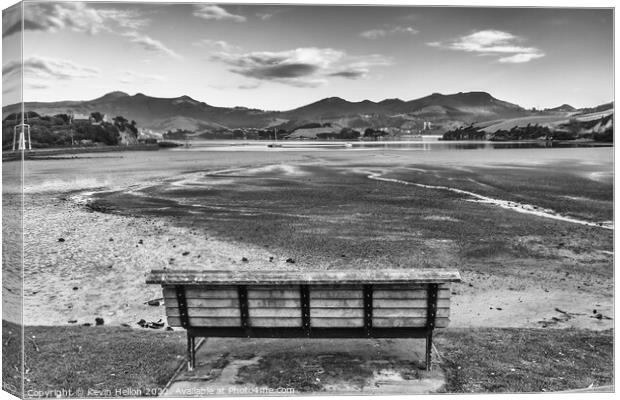 Bench with a view, Portobello, Otago Peninsuar, South Island, Ne Canvas Print by Kevin Hellon