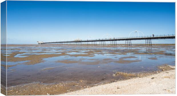 Pools of water in front of Southport Pier Canvas Print by Jason Wells