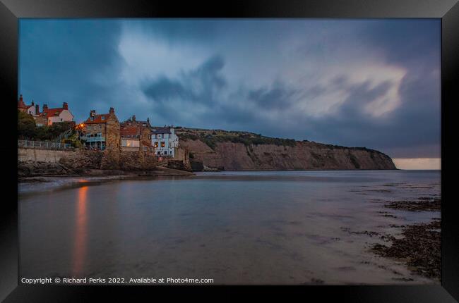 Storm Clouds over Robin Hoods Bay Framed Print by Richard Perks