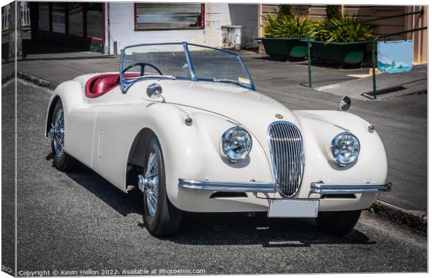 White Jaguar XK120 convertible Canvas Print by Kevin Hellon