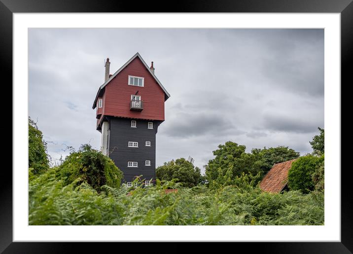 House in the Clouds above greenery Framed Mounted Print by Jason Wells